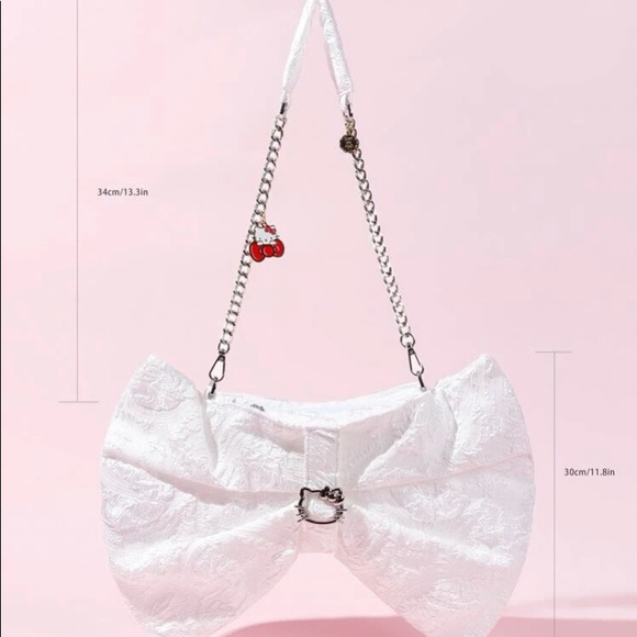 - 🆕 Hello Kitty bow design purse. - Picture 2 of 3